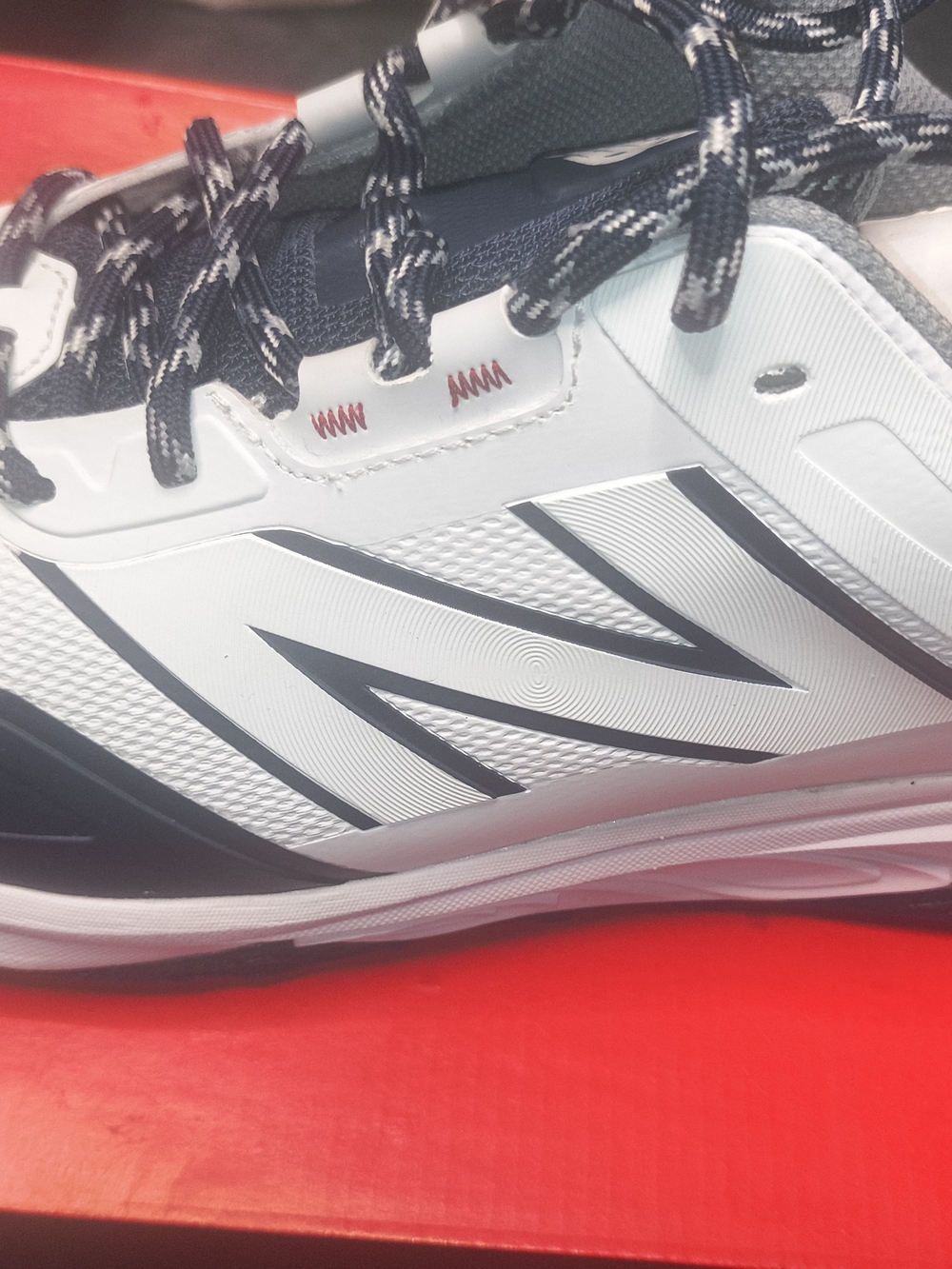 11 men New Balance White and Navy Athletic Sneaker